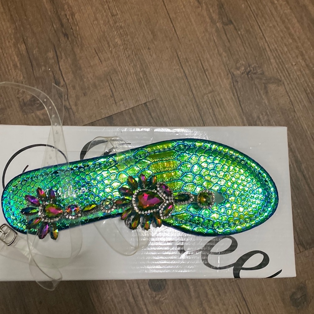 Women sandals, multi colored size 7 slightly used, great condition